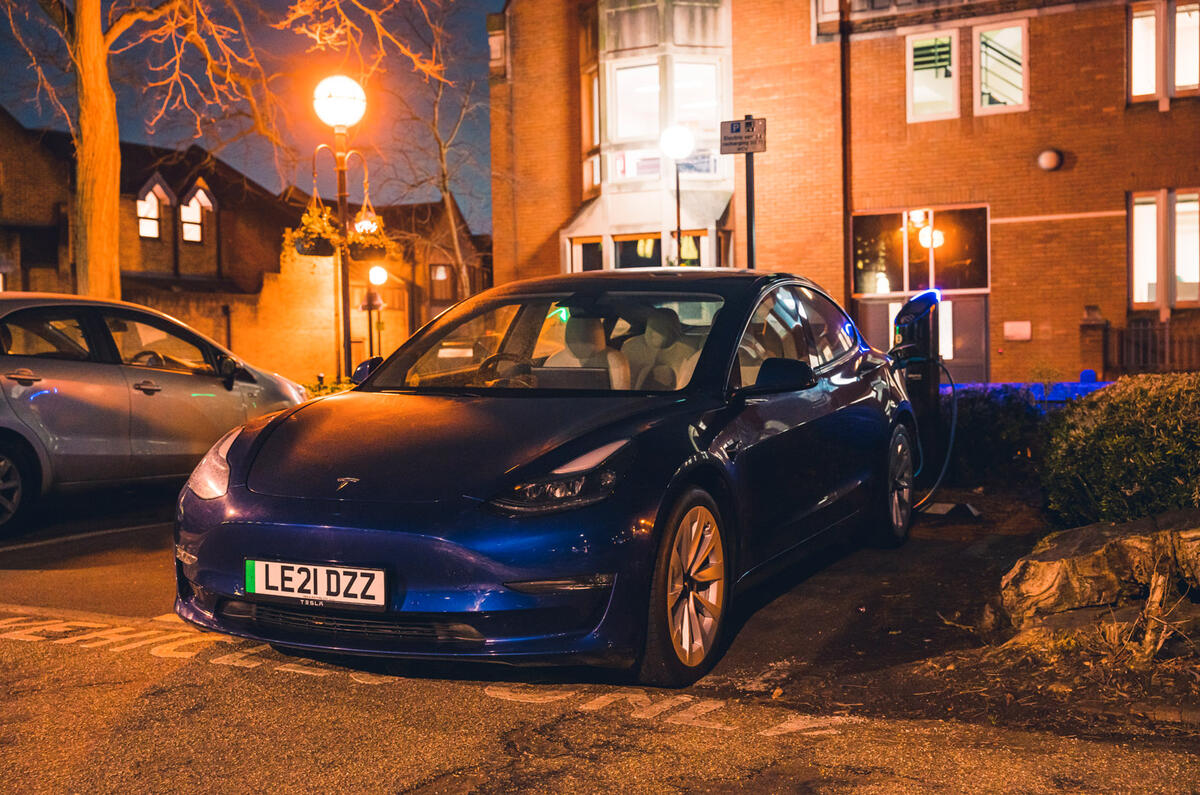 98 tesla model 3 night charging front