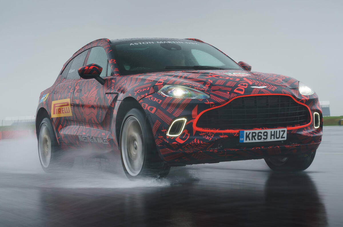 2020 Aston Martin DBX camouflaged prototype ride - hero front