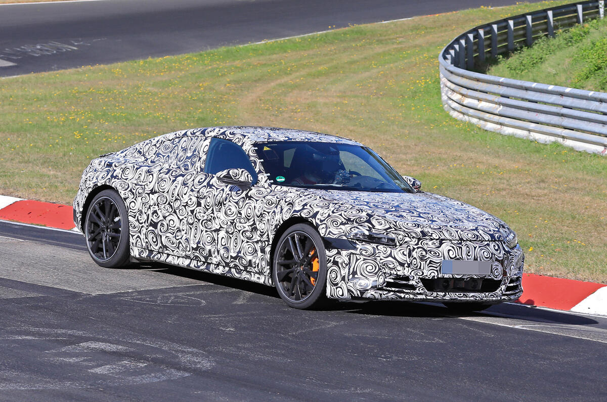 Audi E-tron GT camo track driving - front