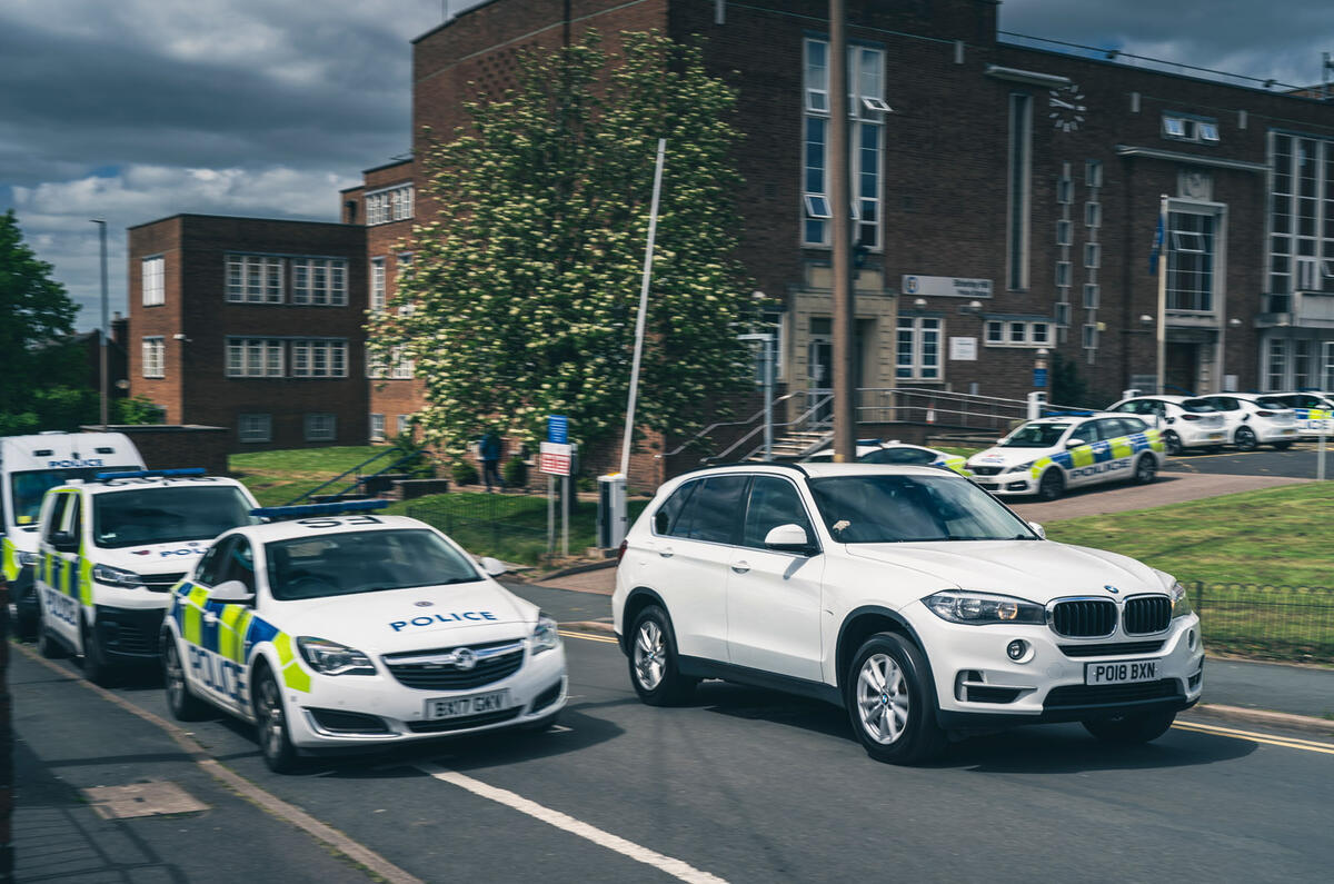 99 bmw x5 panning front quarter police car