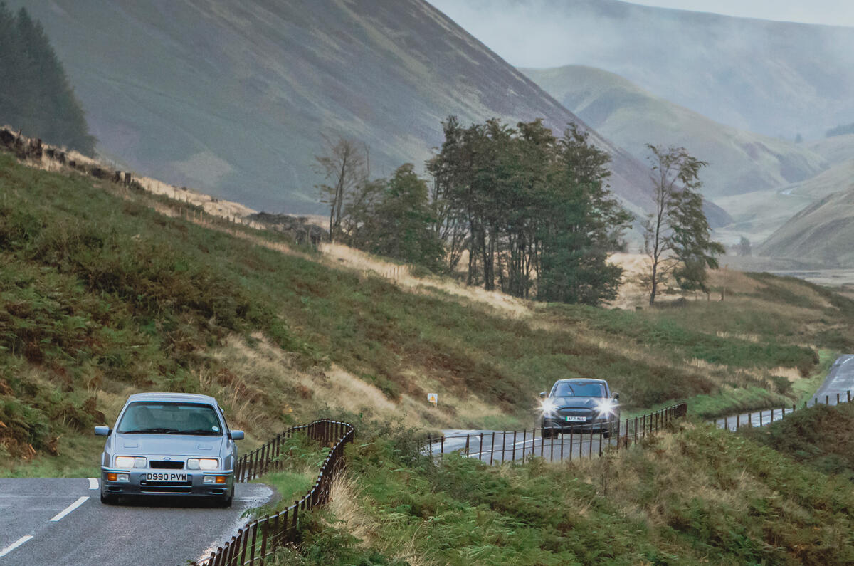 99 Ford Mustang Mach e vs Sierra Cosworth lead 99 Ford Mustang Mach e vs Sierra Cosworth lead