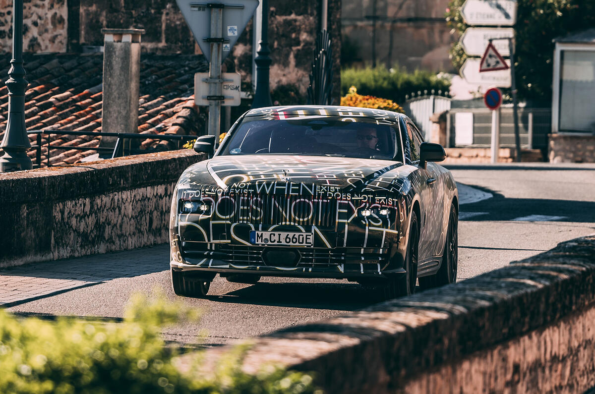 99 Rolls Royce Spectre front town
