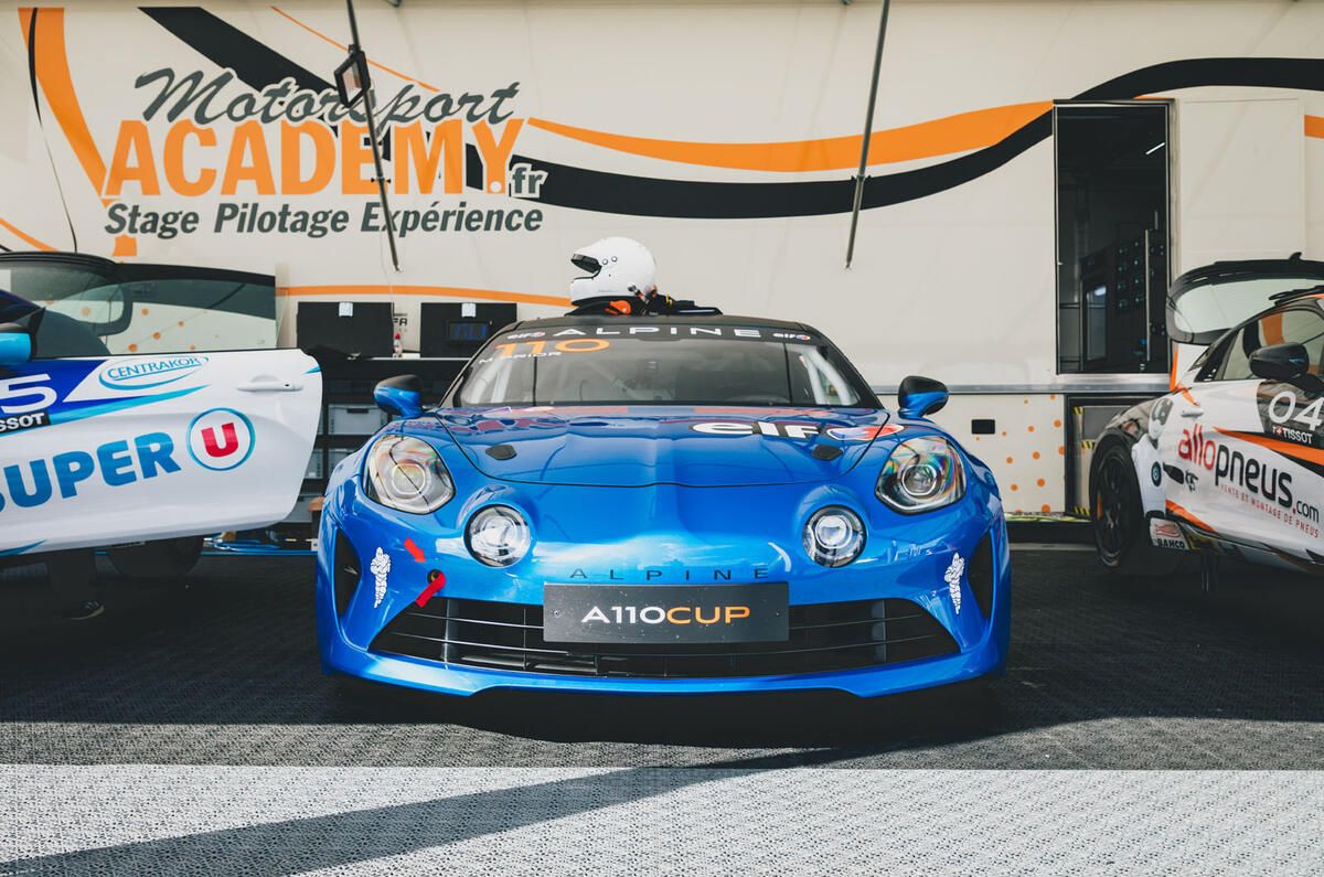 Blue alpine parked Blue alpine parked