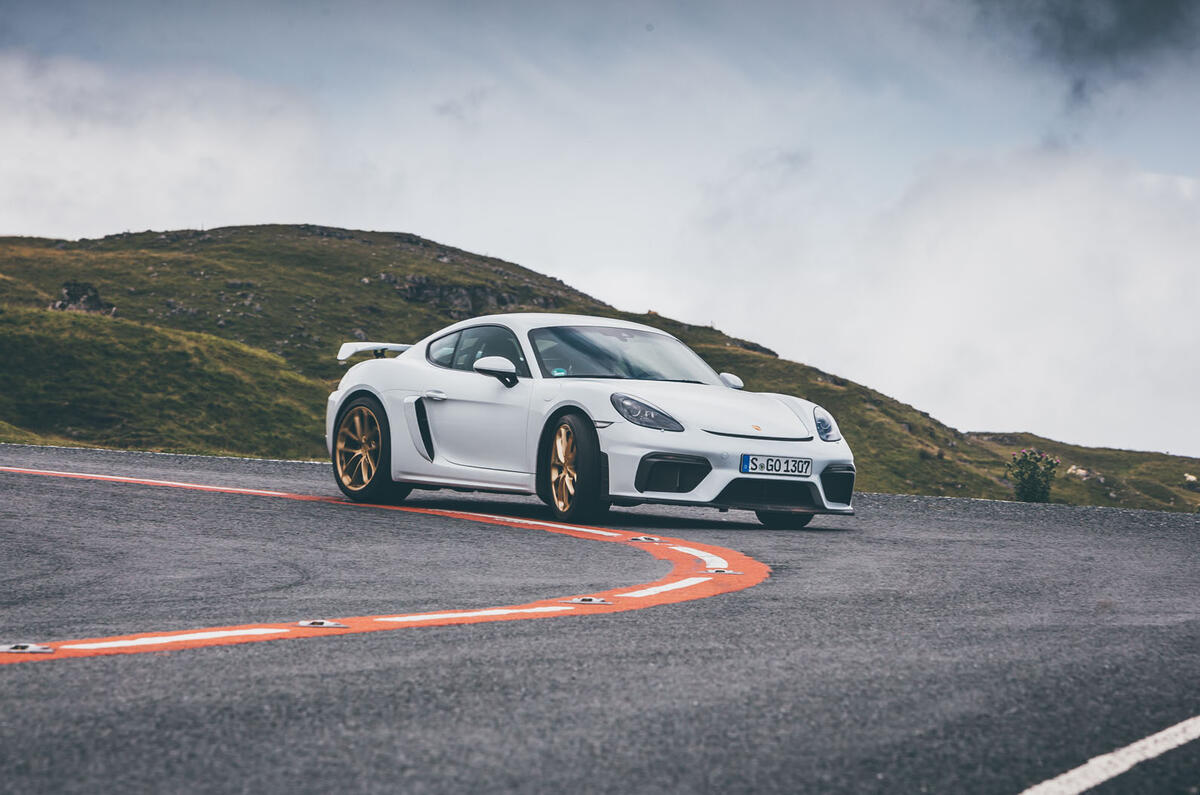 Porsche 718 Cayman GT4 driving - front