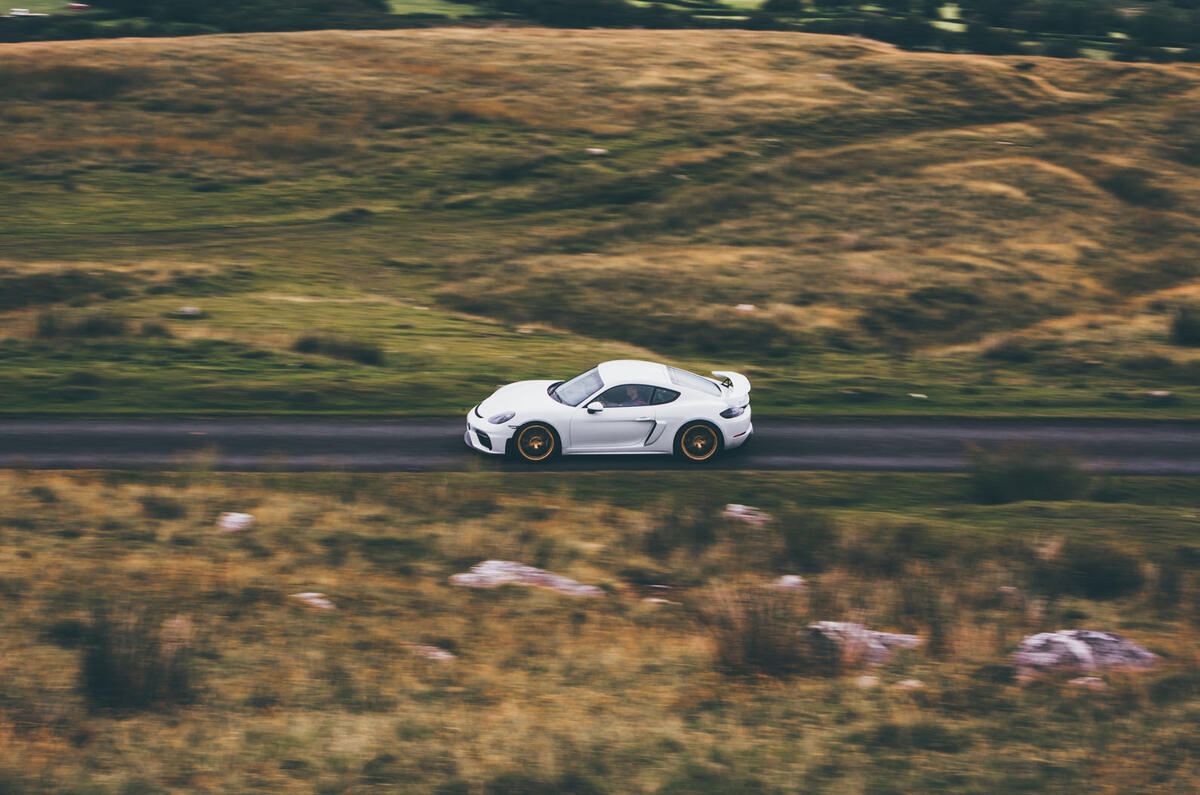 Porsche 718 Cayman GT4 driving - side