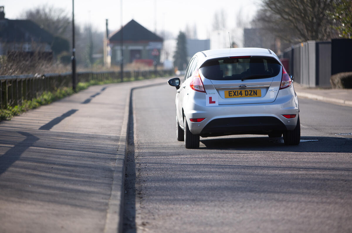 Learner driver in a Ford Fiesta - rear