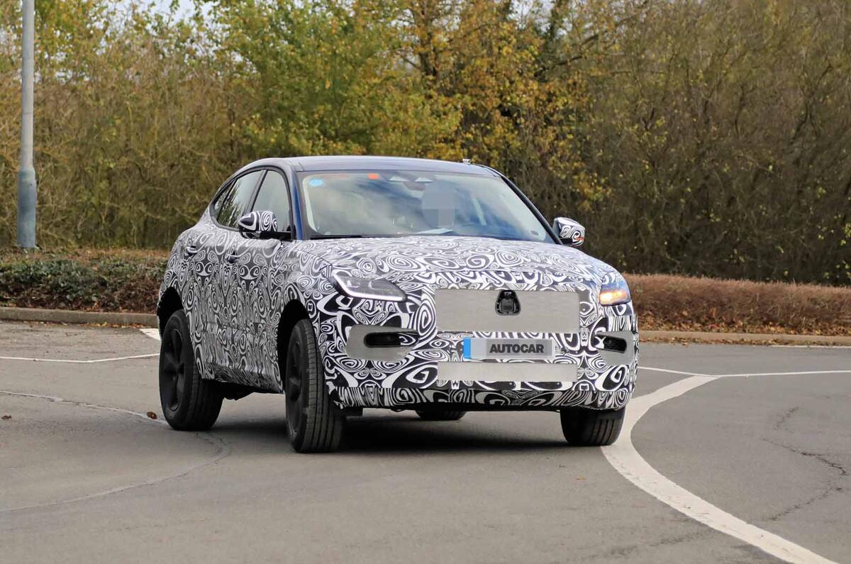 Jaguar E-Pace facelift spies side front far