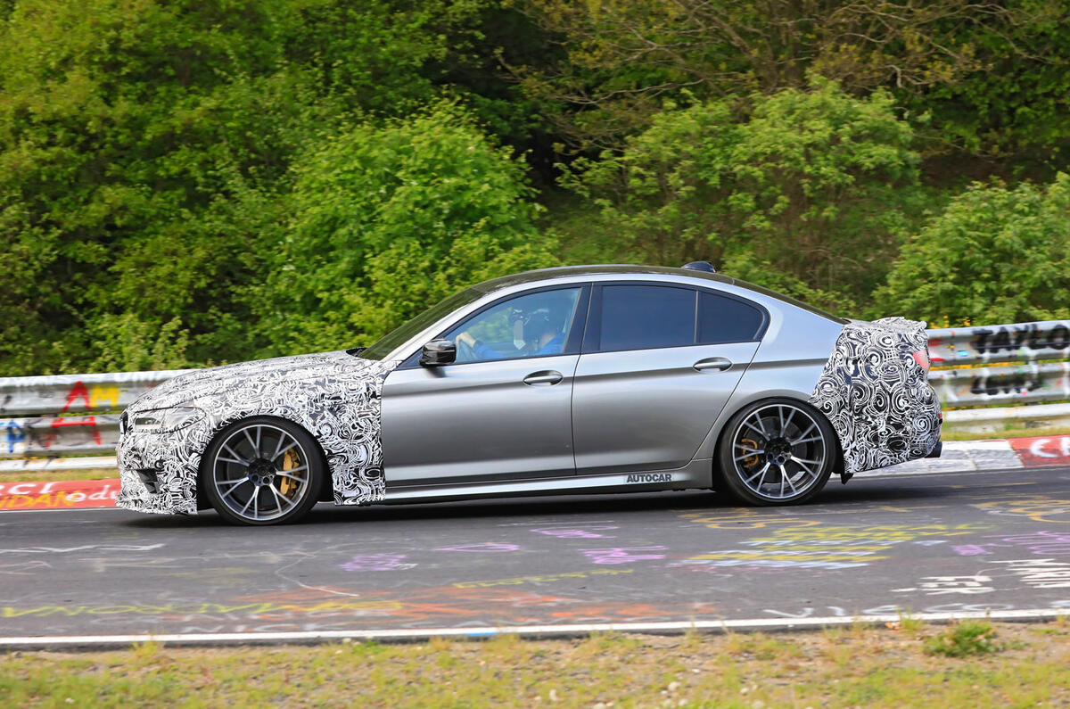 2021 BMW M5 CS prototype at Nurburgring - cornering side 2021 BMW M5 CS prototype at Nurburgring - cornering side