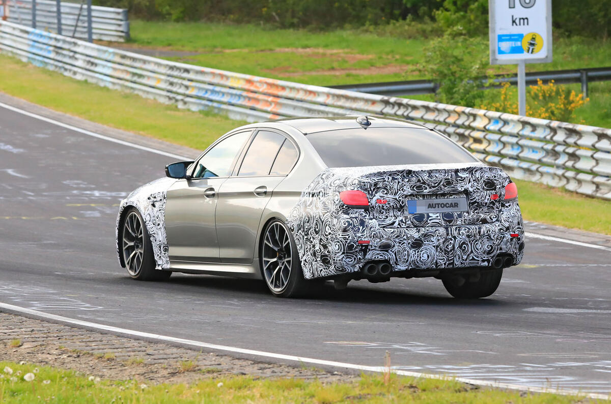 2021 BMW M5 CS prototype at Nurburgring - cornering rear 2021 BMW M5 CS prototype at Nurburgring - cornering rear