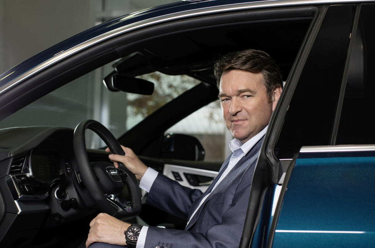 Audi CEO Bram Schott press shot 