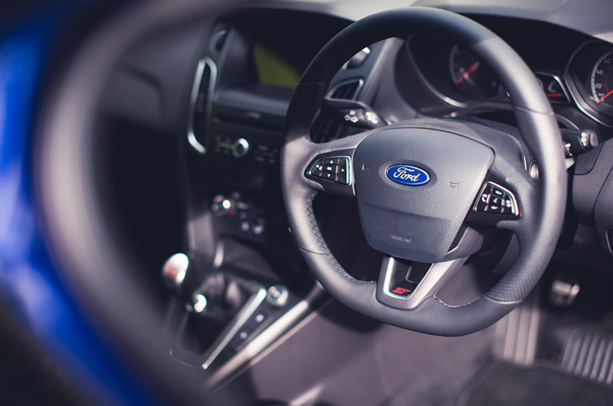 Behind the wheel, the Ford Focus ST and the Focus RS both offer a thrilling experience Behind the wheel, the Ford Focus ST and the Focus RS both offer a thrilling experience
