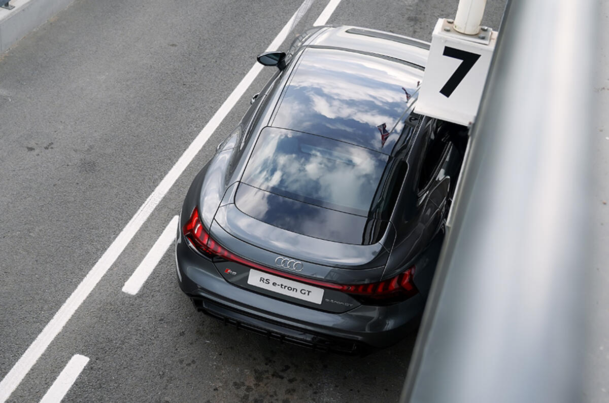 Charged up, ready to go: the Audi RS e-tron GT prepares to leave the pitlane Charged up, ready to go: the Audi RS e-tron GT prepares to leave the pitlane