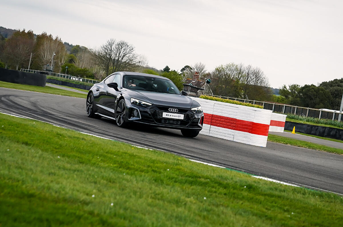 Out of the Chicane, quattro all-wheel-drive propels the Audi RS e-tron GT onto the straight Out of the Chicane, quattro all-wheel-drive propels the Audi RS e-tron GT onto the straight