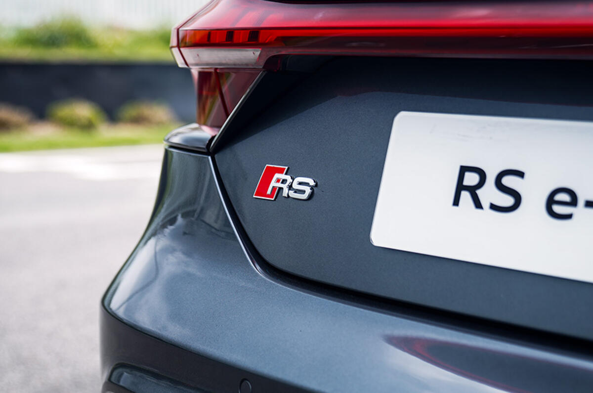 The RS badge indicates the race-bred DNA that underpins the Audi RS e-tron GT The RS badge indicates the race-bred DNA that underpins the Audi RS e-tron GT