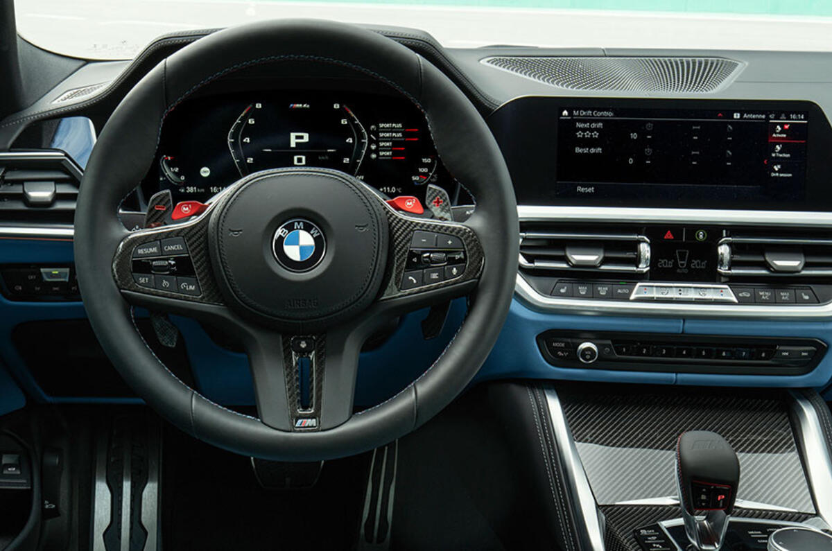 The BMW M3 and M4 boast a stripped-back but stylish driver-focused cockpit The BMW M3 and M4 boast a stripped-back but stylish driver-focused cockpit