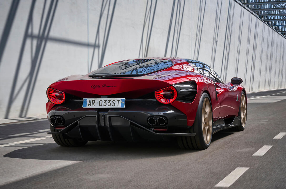 Alfa Romeo 33 Stradale 2023 rear quarter driving Alfa Romeo 33 Stradale 2023 rear quarter driving