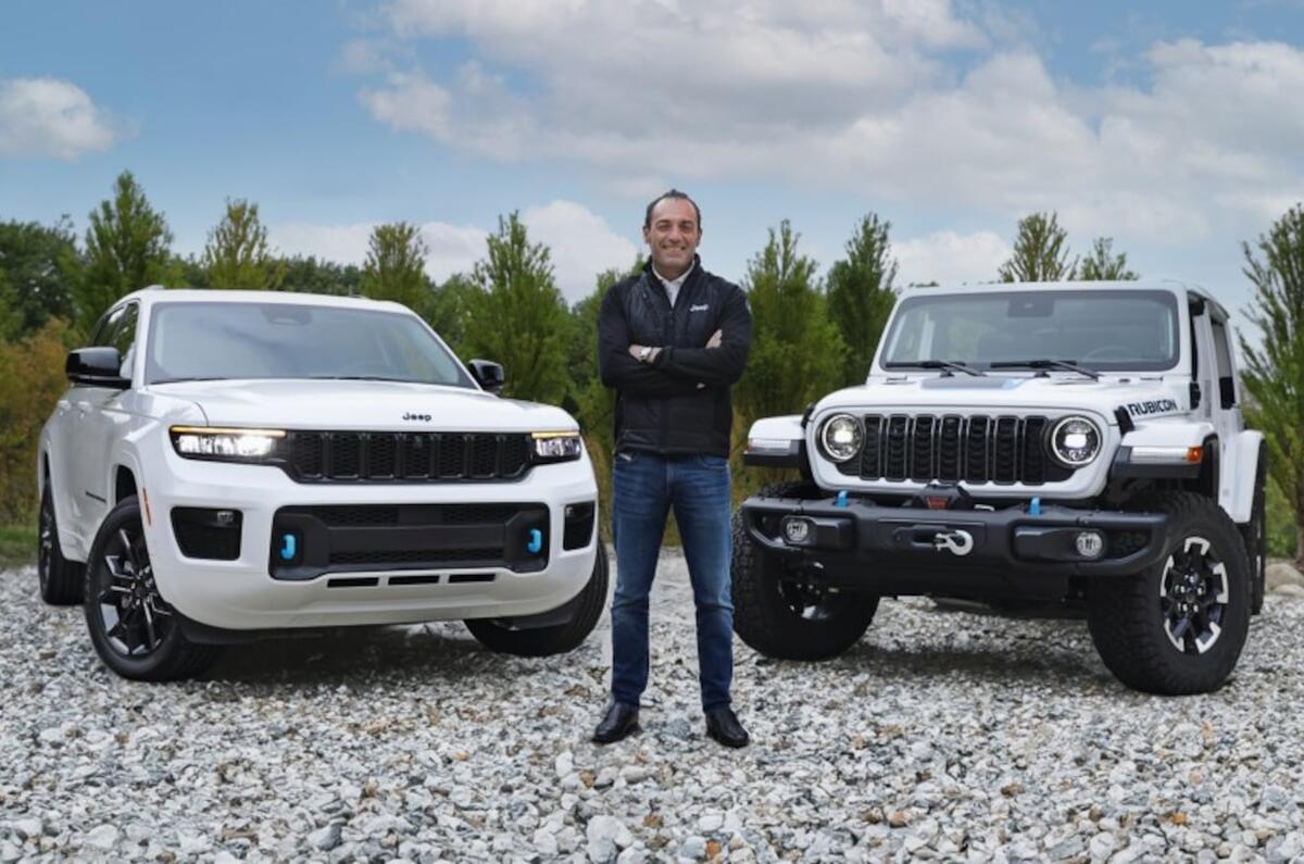 Antonio Filosa with Jeep Wrangler and Grand Wagoneer