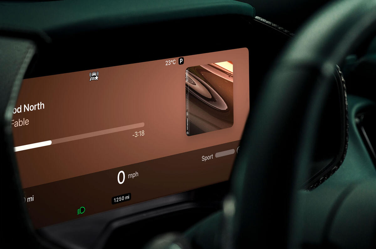 Aston Martin Apple Carplay media on instrument panel Aston Martin Apple Carplay media on instrument panel