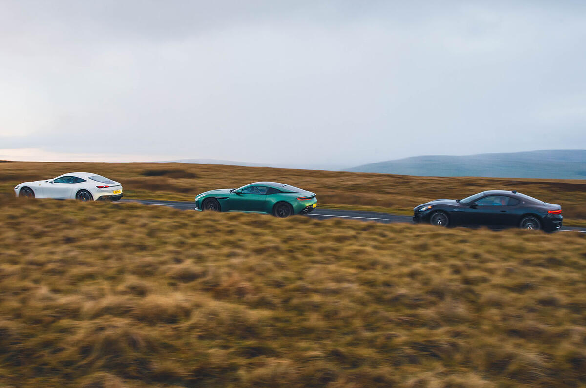 aston martin db12 vs maserati granturismo vs ferrari roma 2023 rear