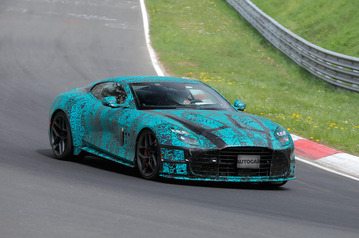 Aston Martin Vanquish prototype at the Nurburgring front cornering Aston Martin Vanquish prototype at the Nurburgring front cornering