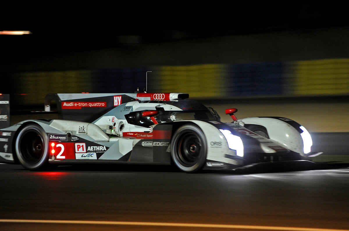 Audi dominated Le Mans with its hybrid R18 e-tron quattro in 2012, 2013 and 2014 Audi R18 e-tron quattro Le Mans night action