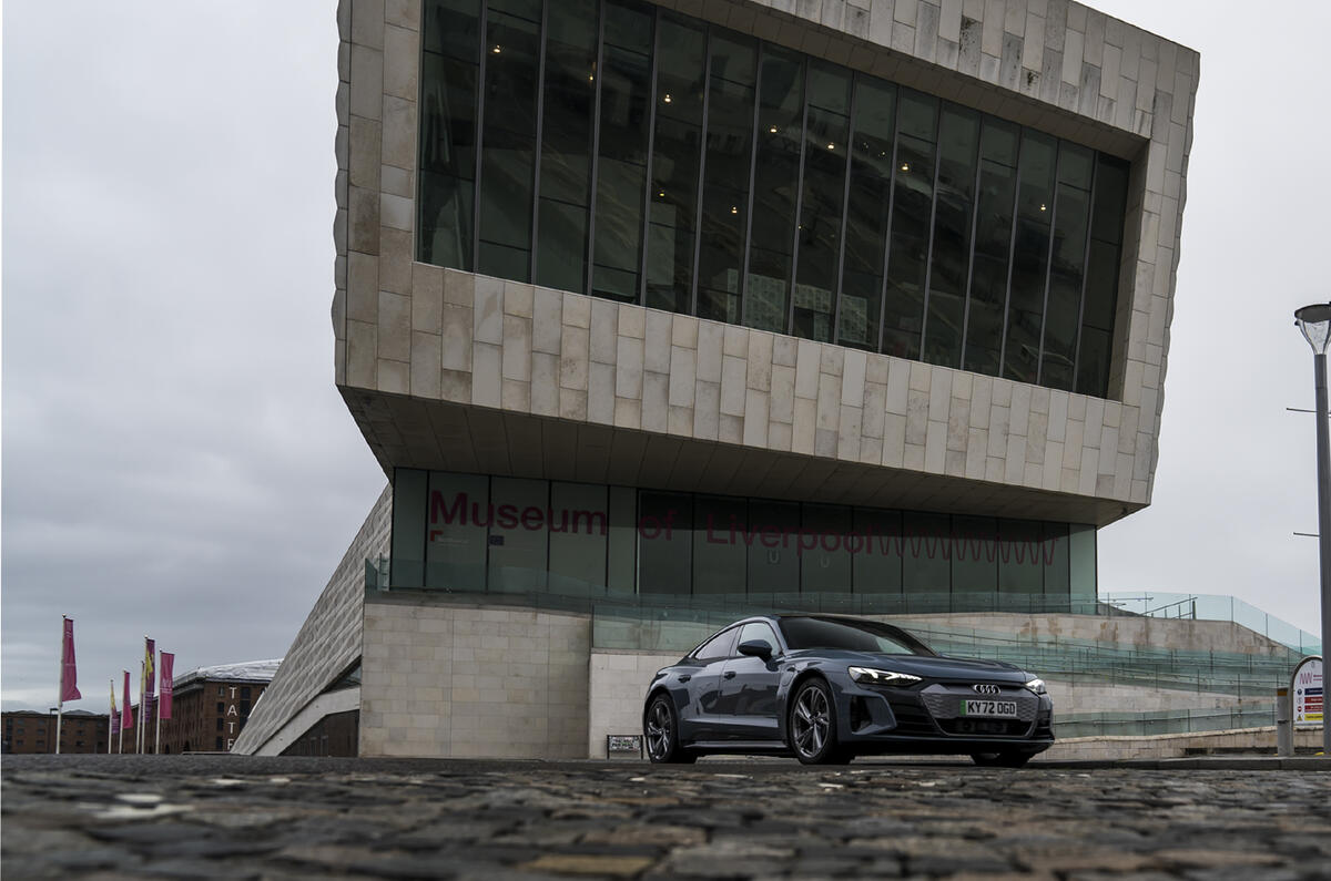 The stark concrete slops of the Liverpool Museum are the perfect backdrop for the Audi e-tron GT AudiGT Promotedstory ROADTRIP DAWN 1d