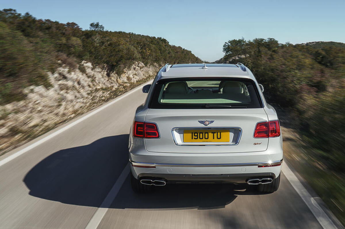 2019 Bentley Bentayga Hybrid - driving rear