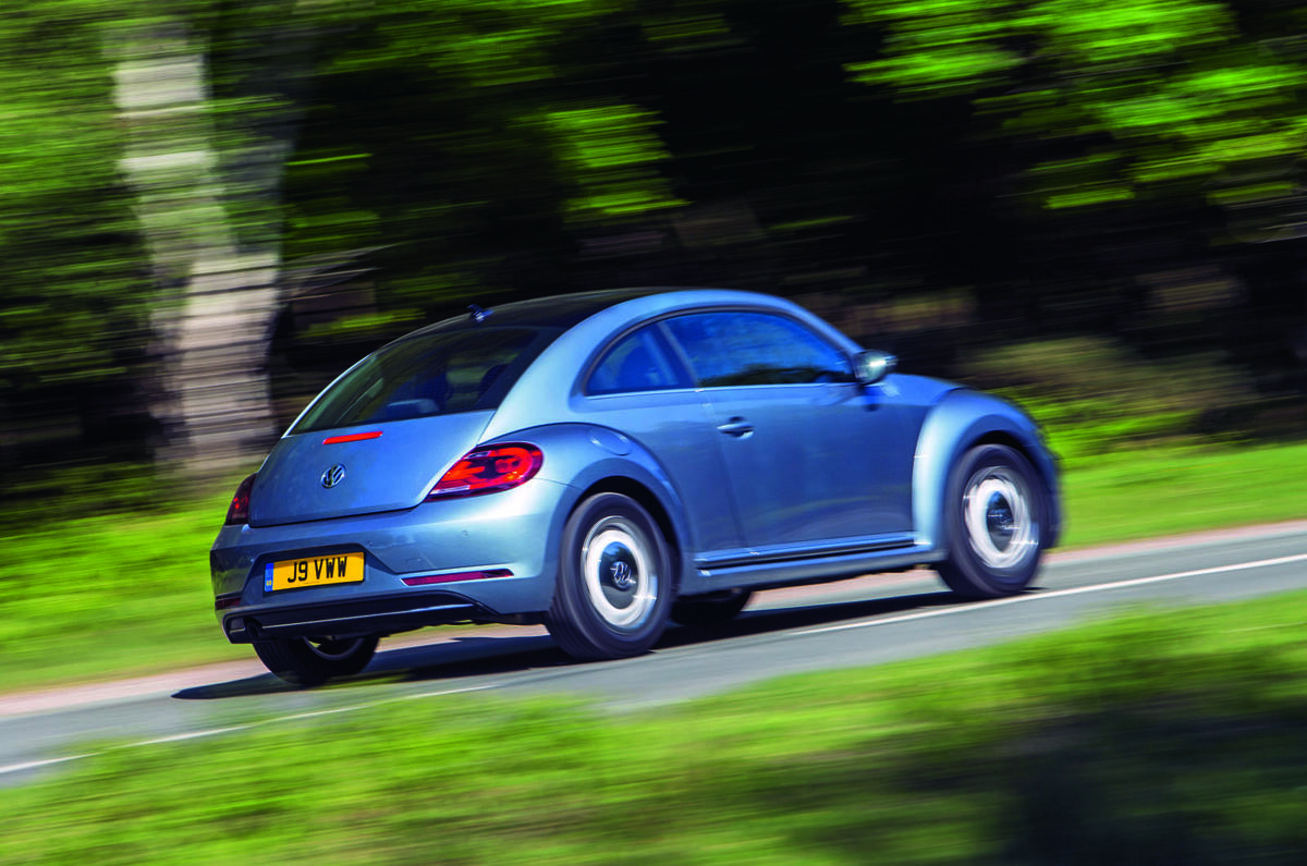 Volkswagen Beetle driving - rear