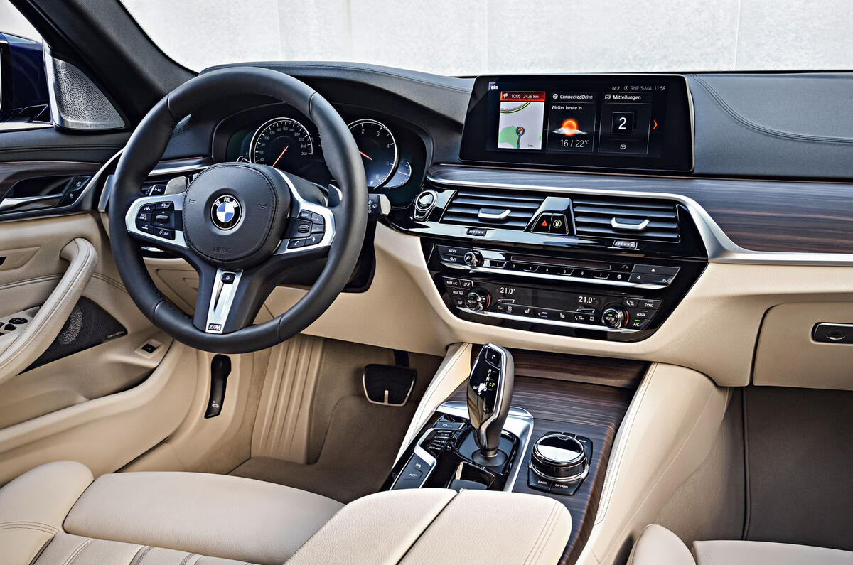 2017 BMW 5 Series Touring interior from side angle