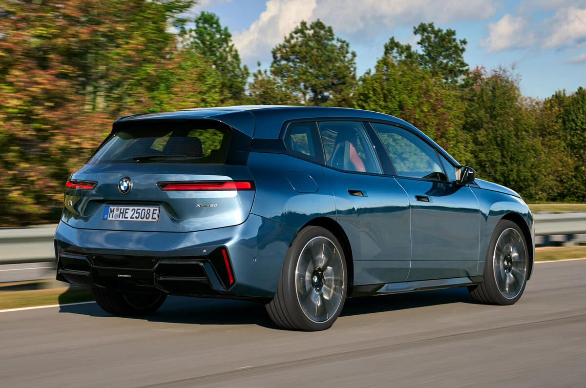BMW iX 2025 xDrive 60 M Sport rear qtr tracking