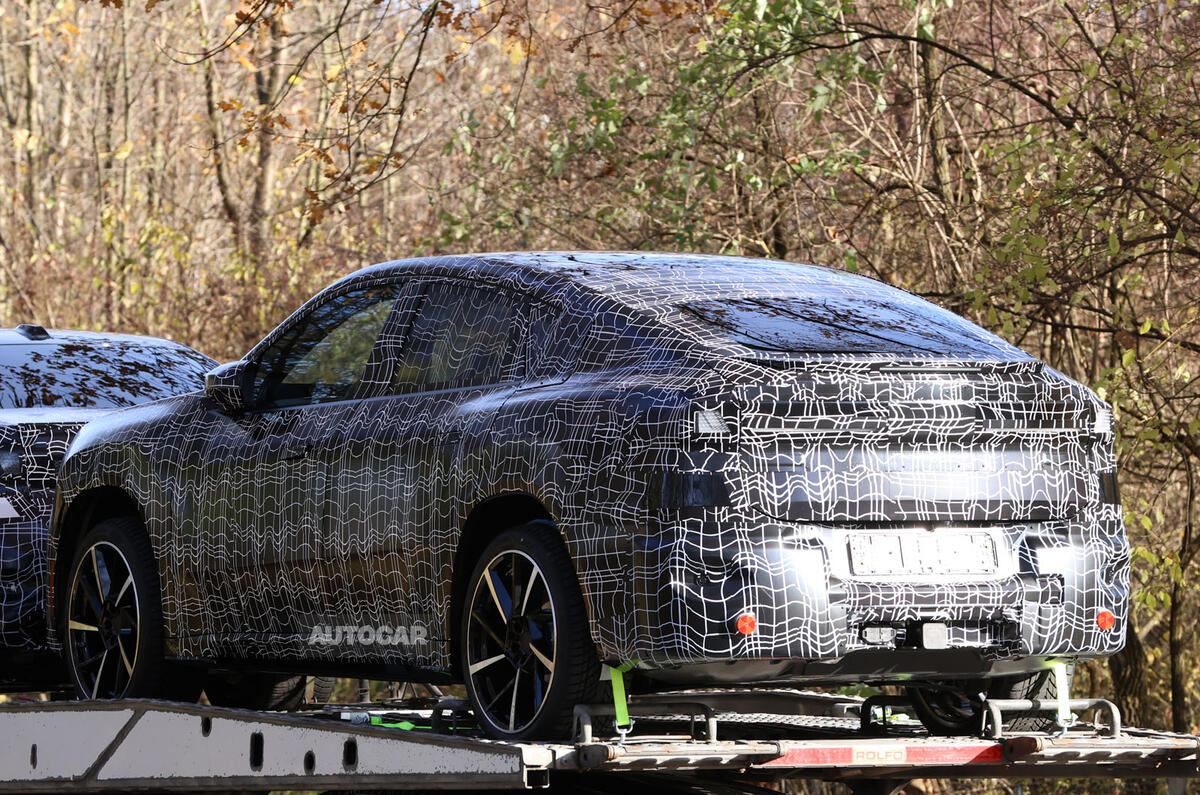 BMW iX4 camo rear quarter 2