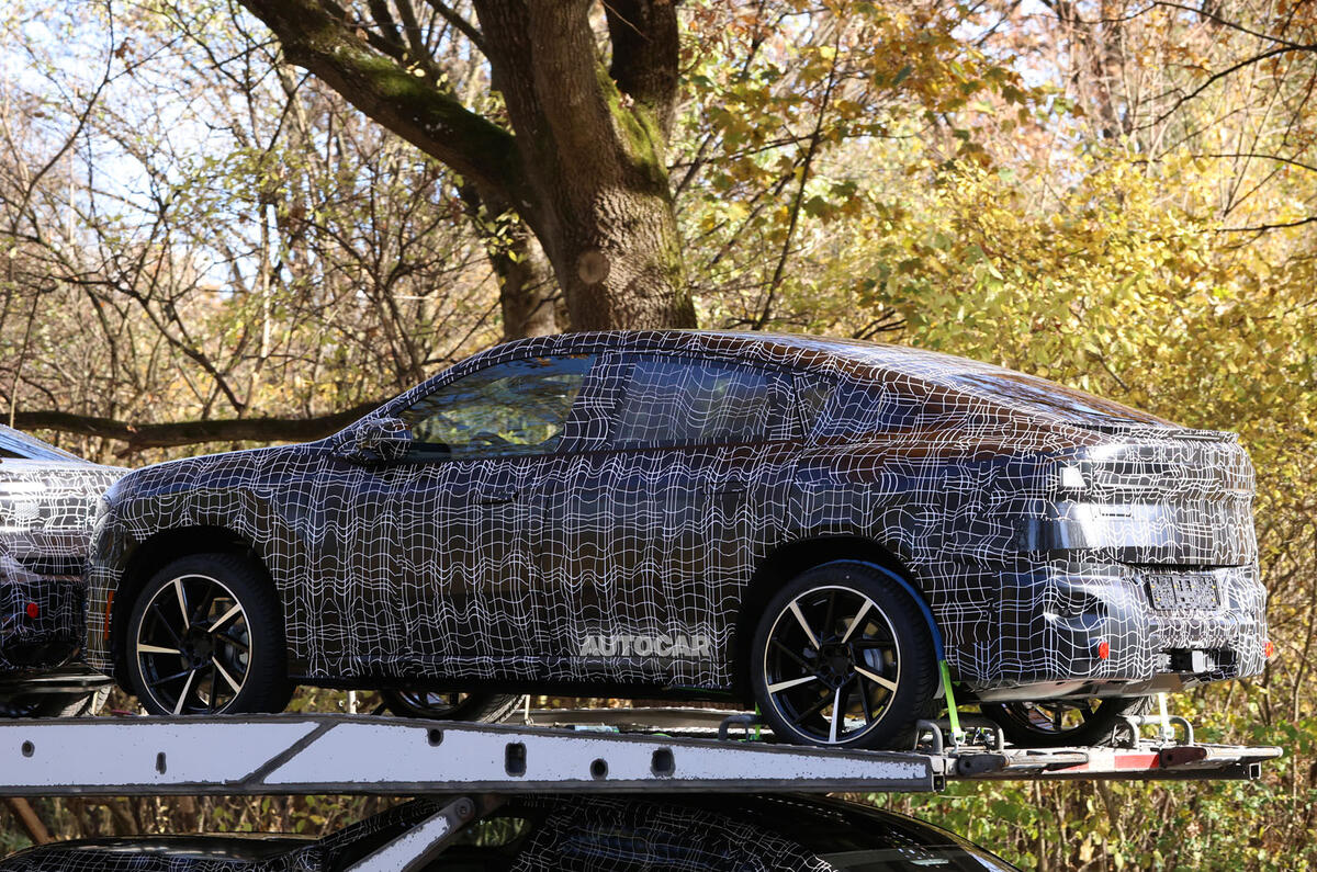 BMW iX4 camo rear quarter