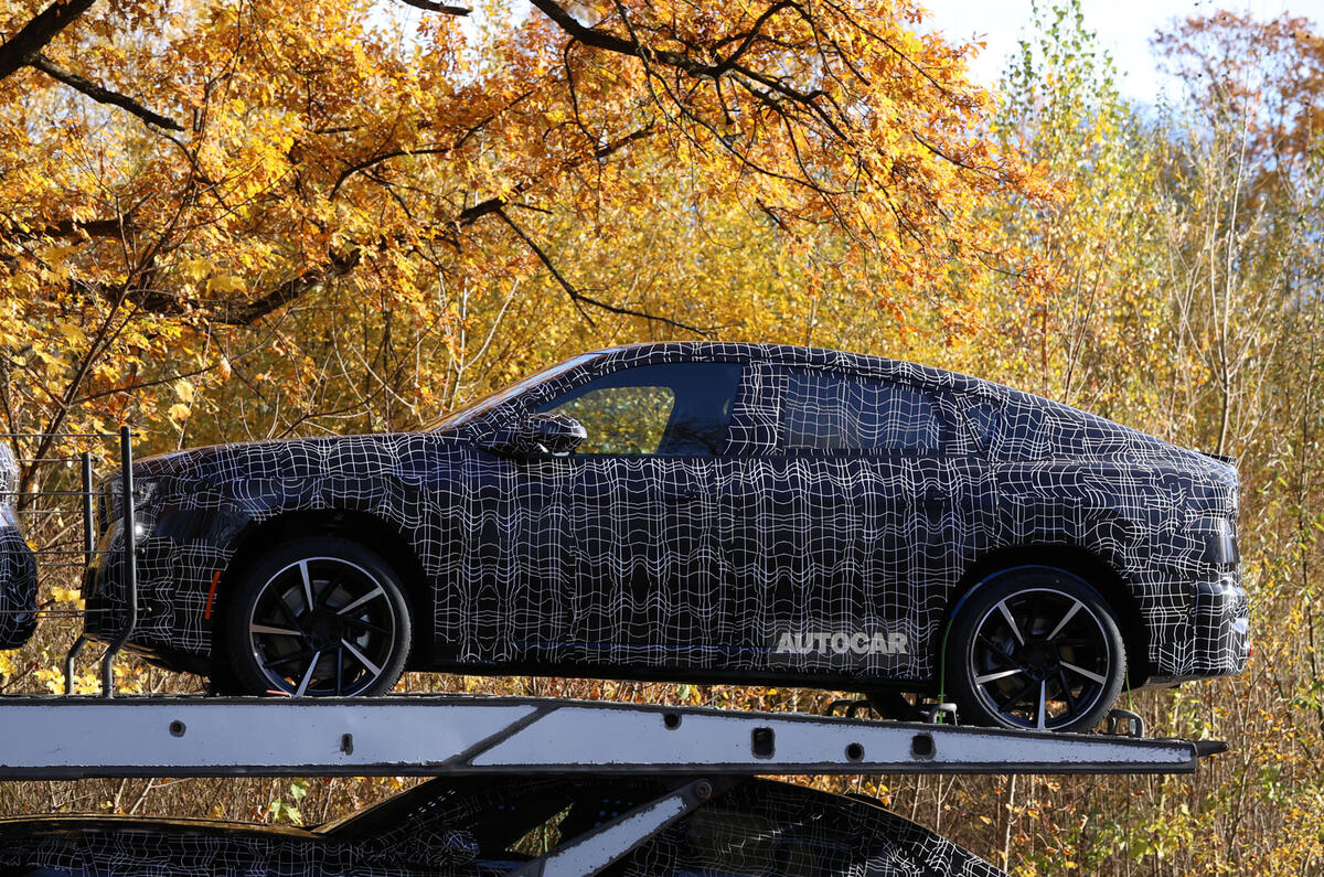 BMW iX4 camo side