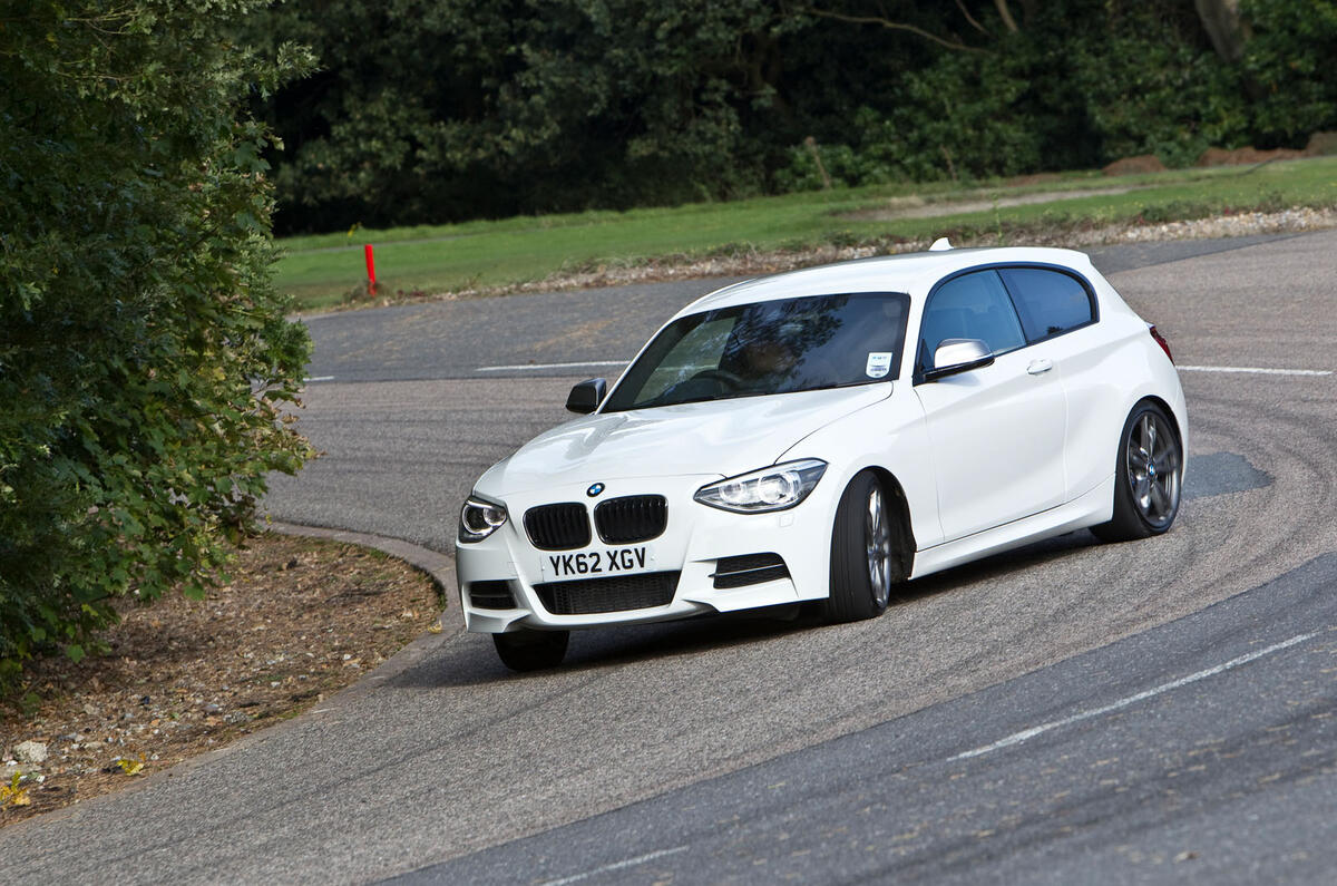 BMW M135i 2012 front quarter slide BMW M135i 2012 front quarter slide