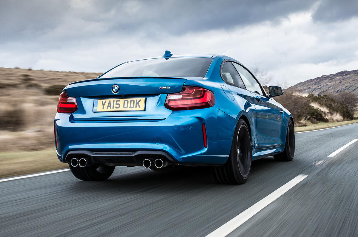 BMW M2 rear three quarter tracking BMW M2 rear three quarter tracking