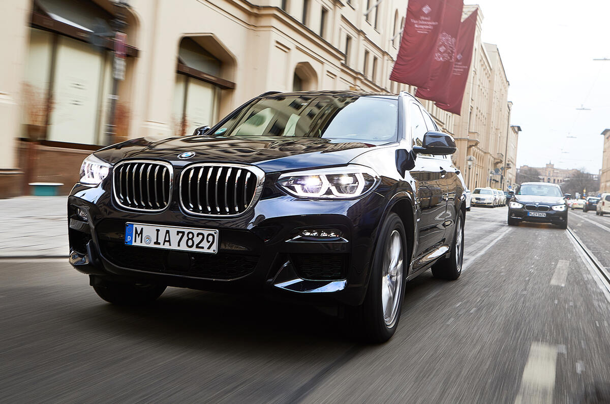 BMW X3 PHEV official press images - on the road