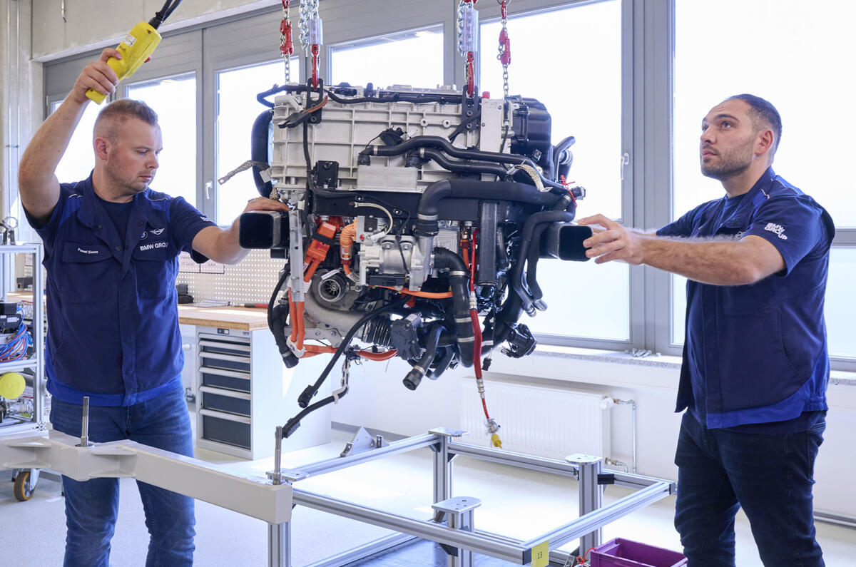 BMW hydrogen powertrain with engineers