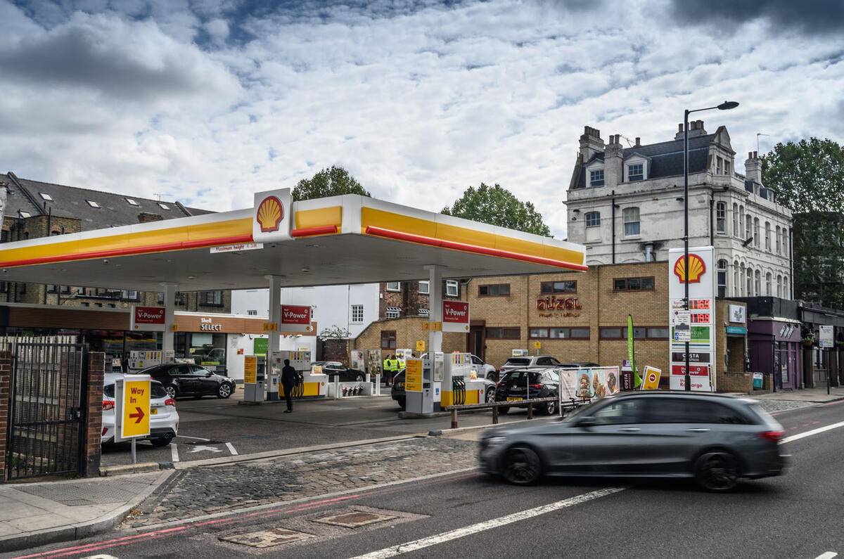 Car entering petrol station forecourt