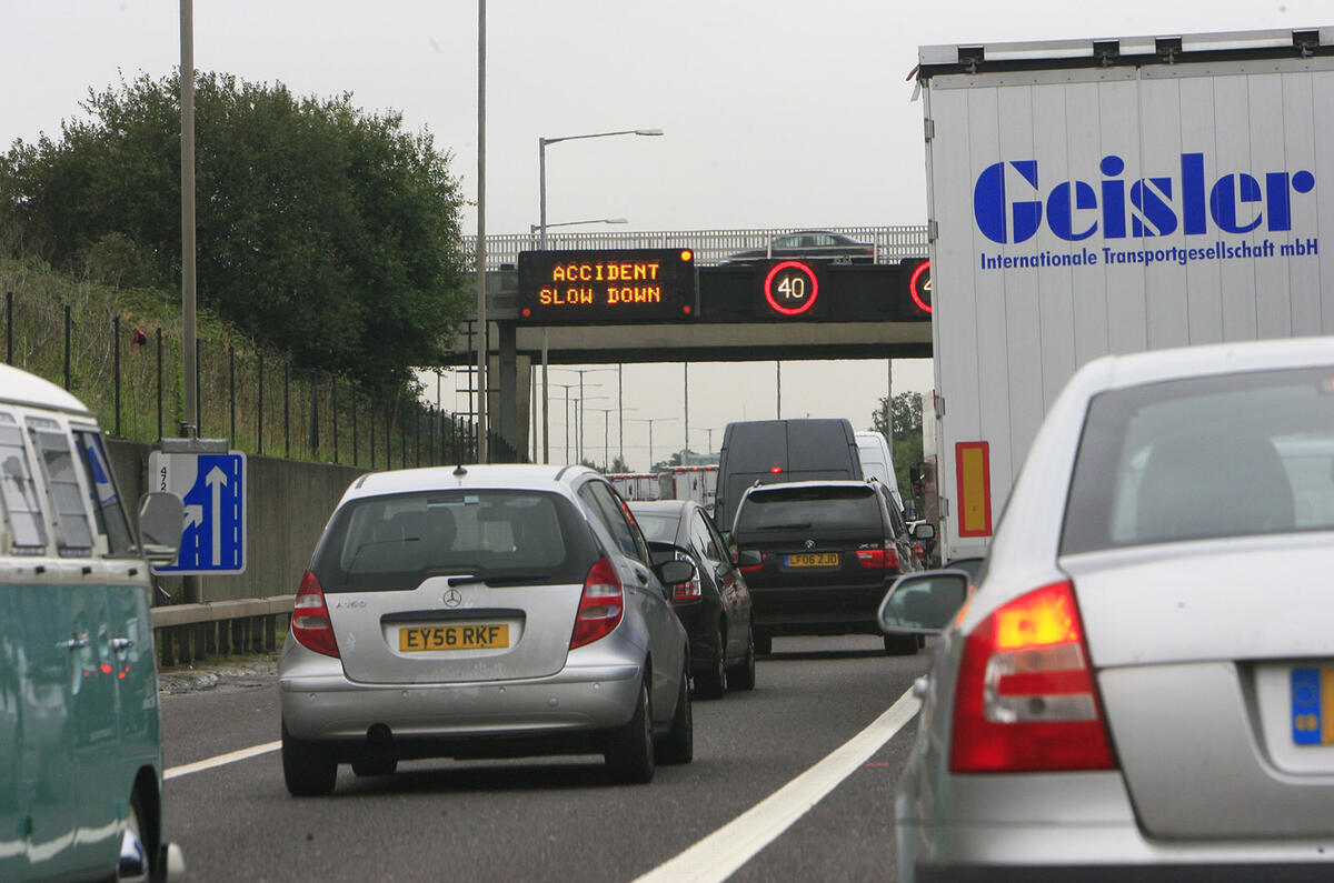 Motorway queue caution sign
