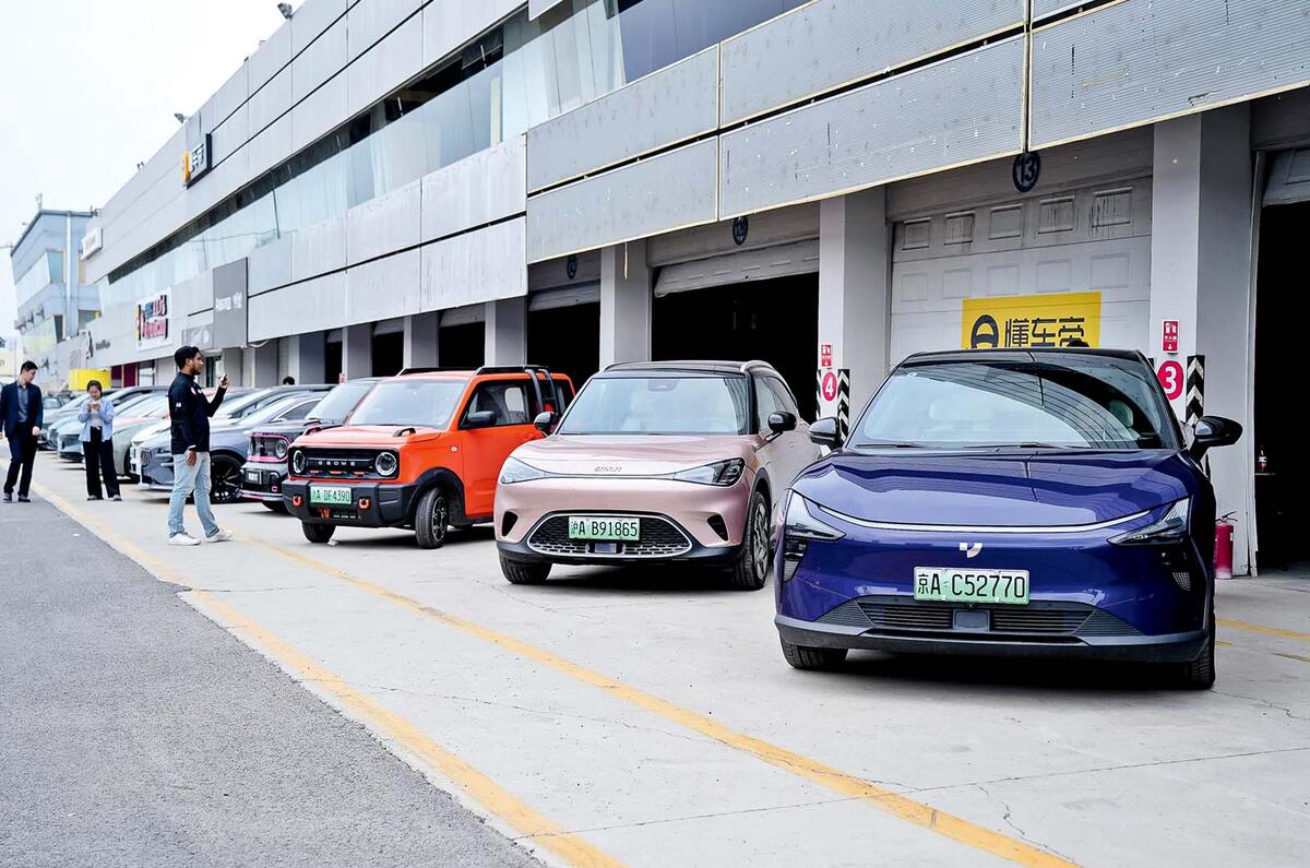 Chinese cars in pitlane Chinese cars in pitlane