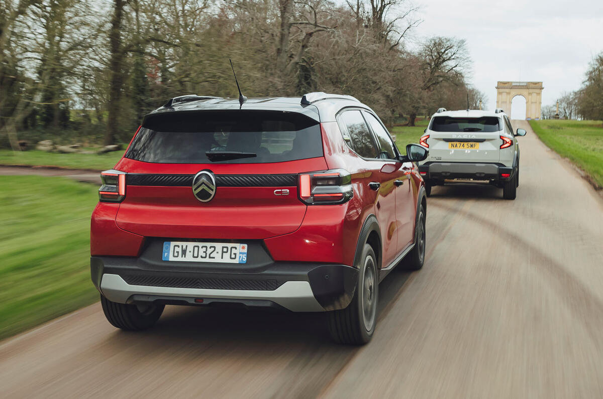 Citroen C3 following Dacia Duster rear Citroen C3 following Dacia Duster rear