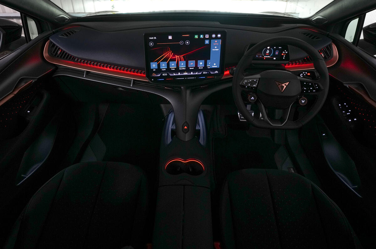 CUPRA Tavascan interior shot showing red ambient lighting 