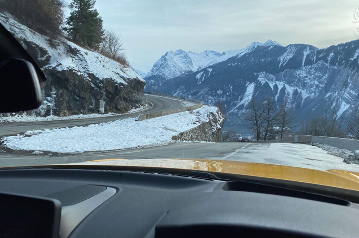The perfect view: the long bonnet of the Toyota GR Supra and a twisty Alpine road with a dramatic backdrop The perfect view: the long bonnet of the Toyota GR Supra and a twisty Alpine road with a dramatic backdrop