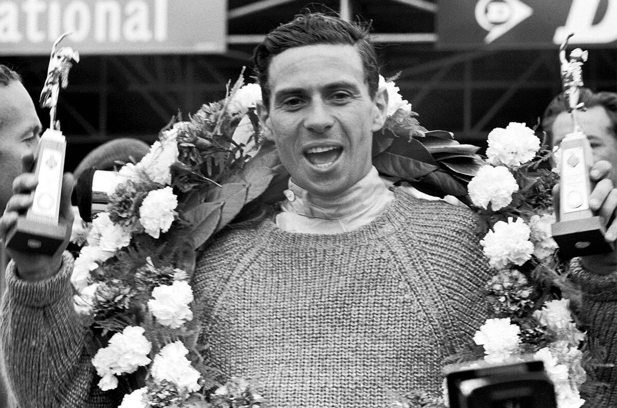 Clark with wreath and trophy