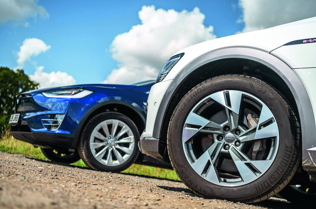 Audi E-tron and Tesla Model X front wheels
