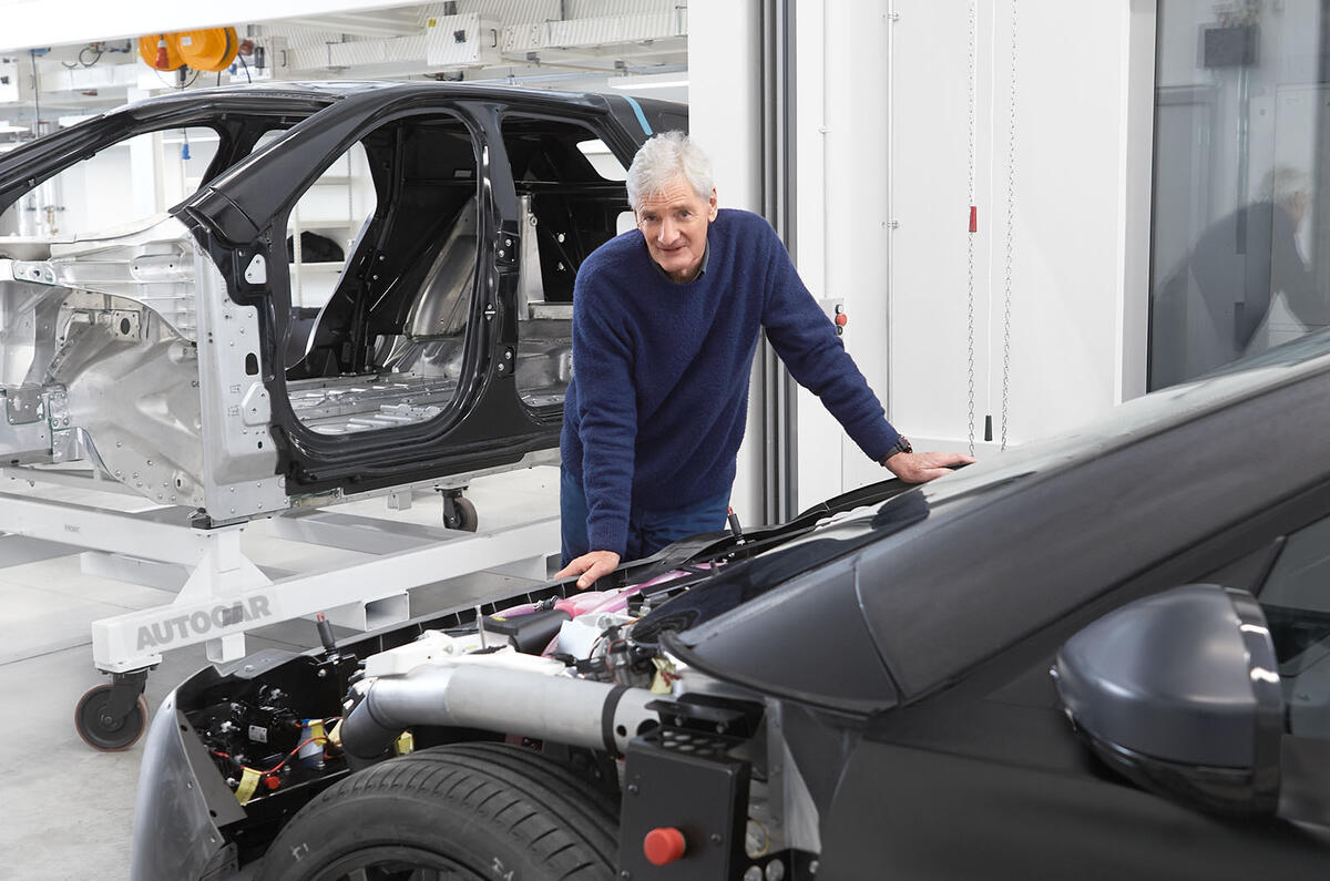 James Dyson with Dyson electric car