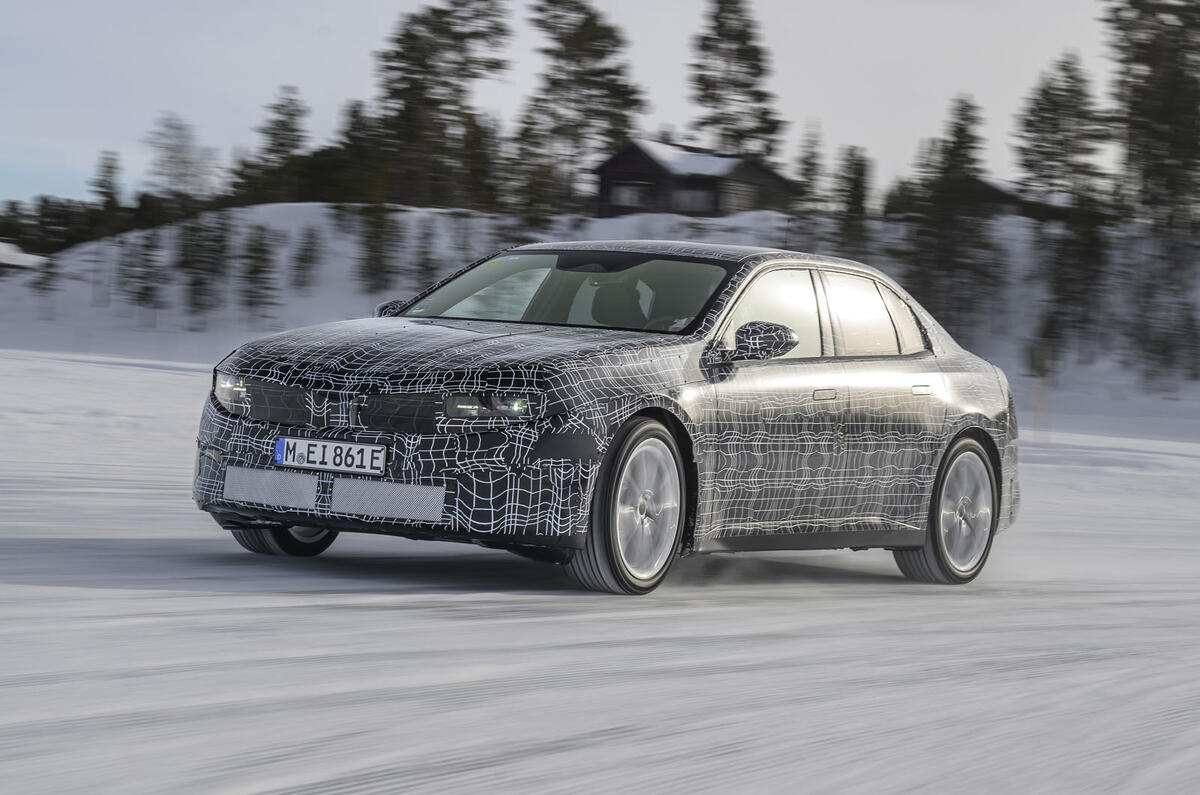 Electric BMW 3 Series prototype winter testing   front three quarter, cornering