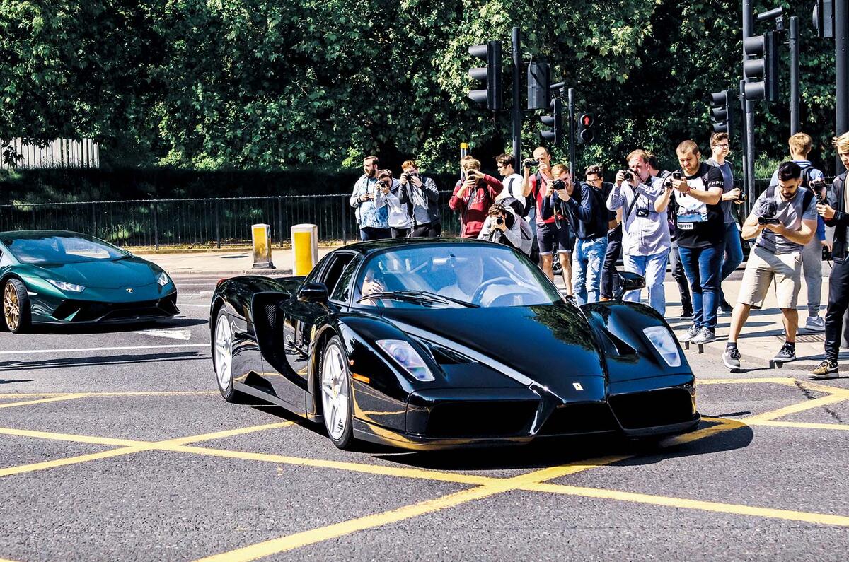 Ferrari Enzo driving on street Ferrari Enzo driving on street