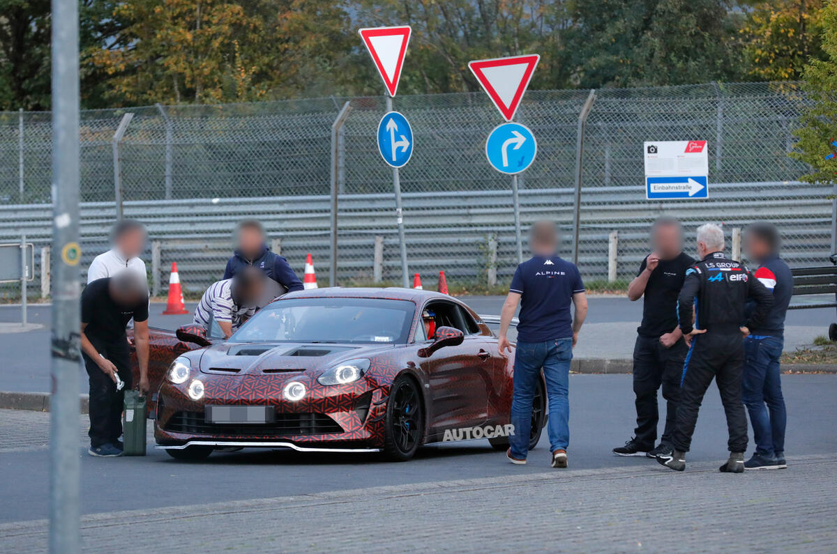 Final Alpine A110 parked with engineers Final Alpine A110 parked with engineers