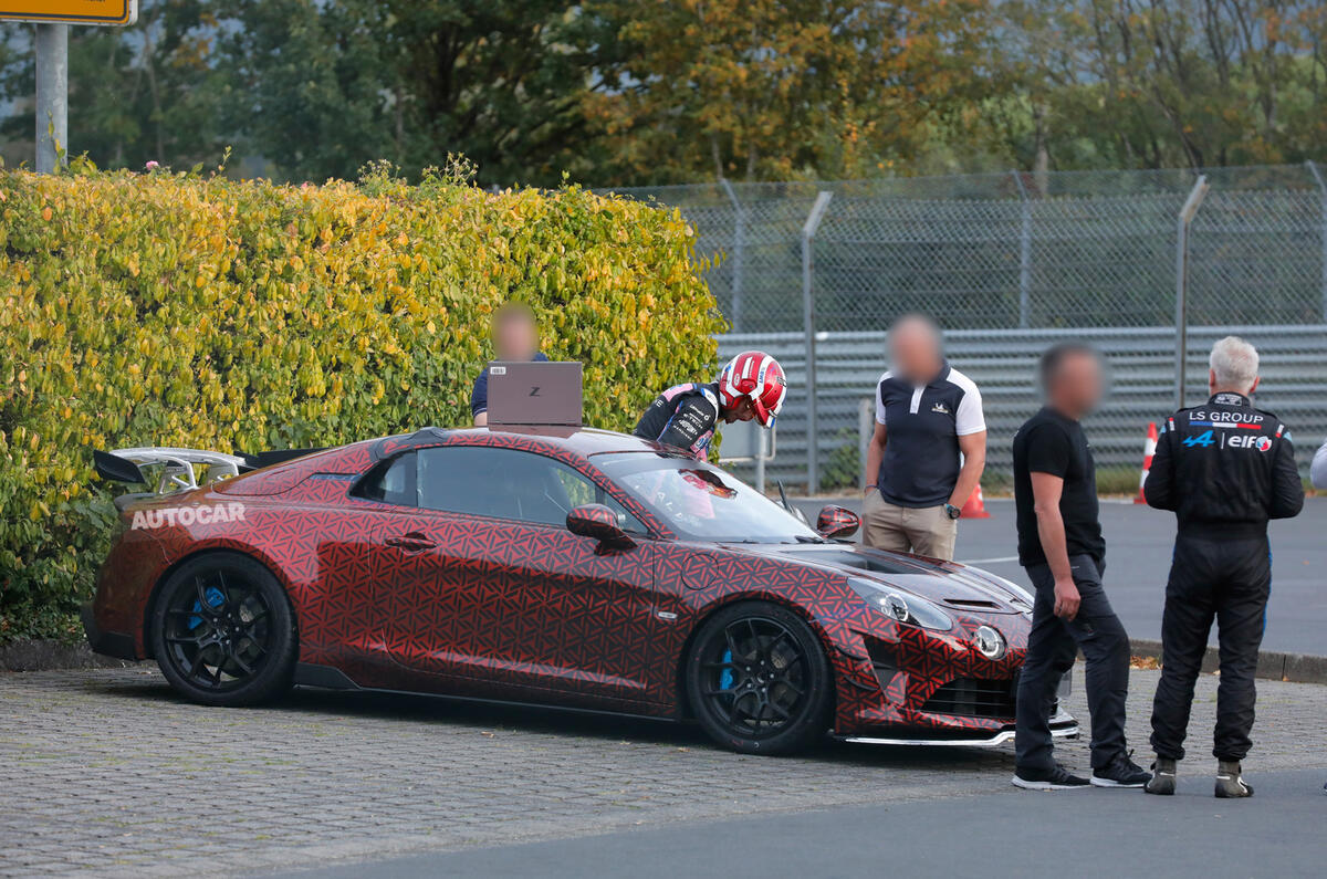 Final Alpine A110 parlked with engineers 2 Final Alpine A110 parlked with engineers 2